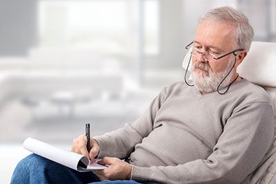 a older man making a list for his estate plan
