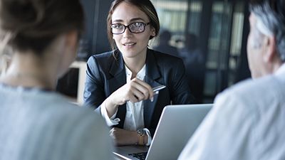 an attorney giving advice to two people about transferring assets to non-relatives