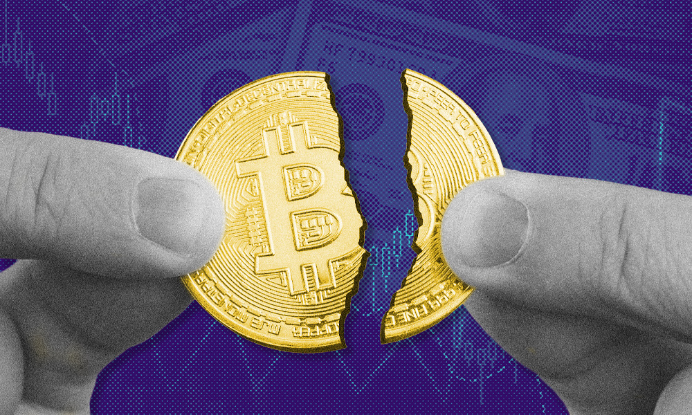 Two hands holding a broken Bitcoin coin against a purple background with faded dollar bills and graphs.