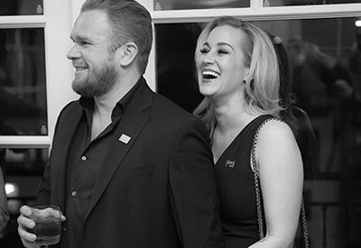 Kelly Pickler and her late husband at a party showing happiness