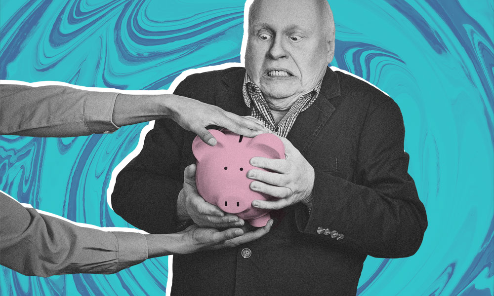 An elderly man appears surprised, clutching a pink piggy bank as another person’s hands reach towards it