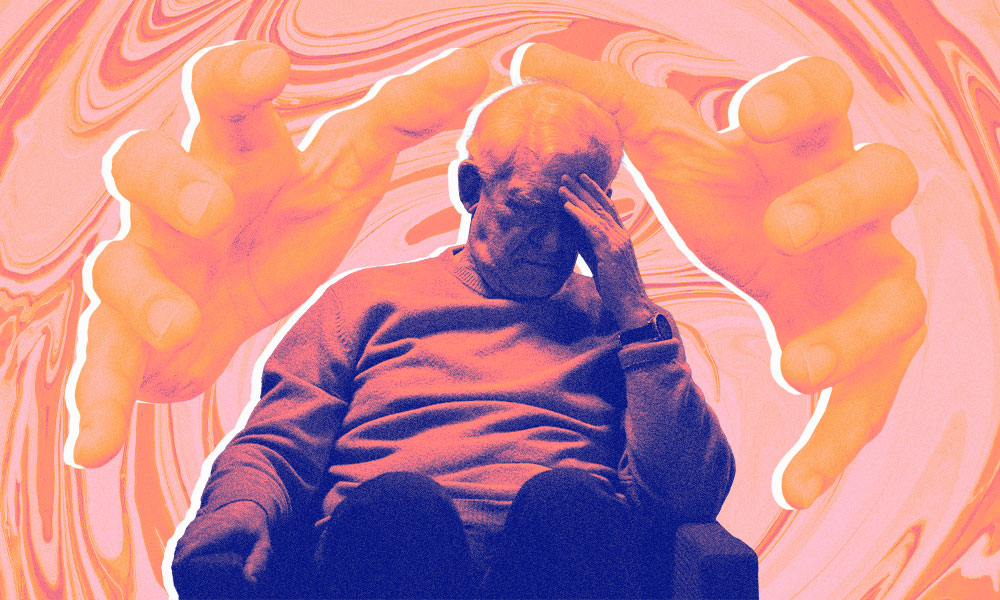An elderly man sits with his head in his hand, contemplating estate planning as a pressing concern.