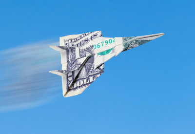 paper airplane made from a one dollar bill