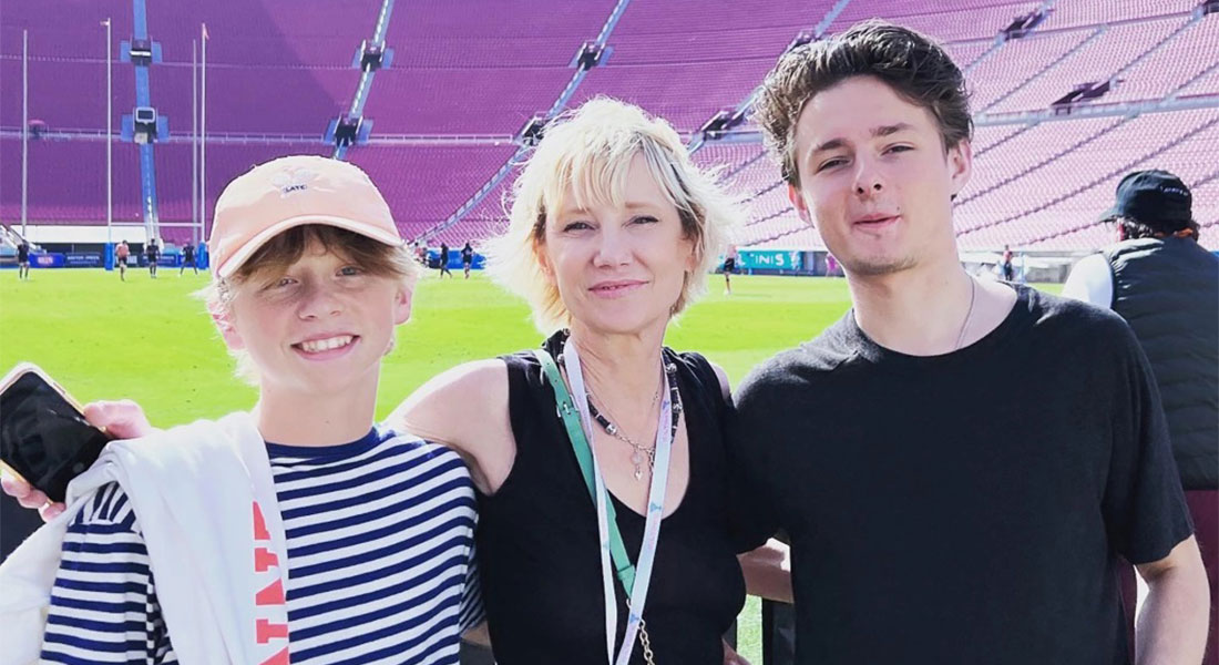 Anne Heche at a sports stadium with her two children