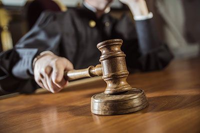 a probate judge slamming a gavel in probate court