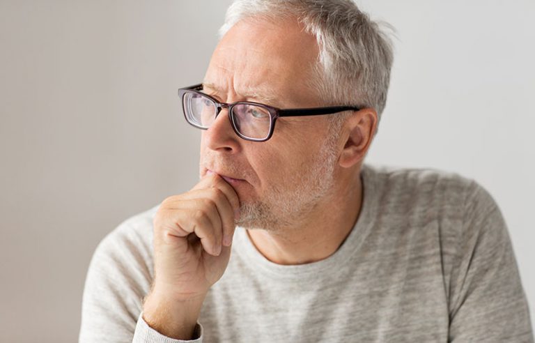 a senior man thinking about his estate plan