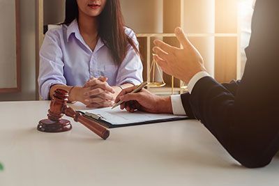 a legal meeting between an estate planning attorney and client