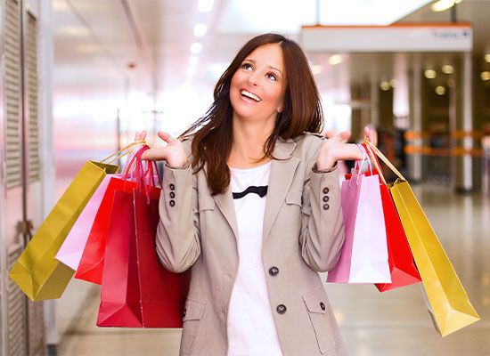 a woman going on a shopping spree 