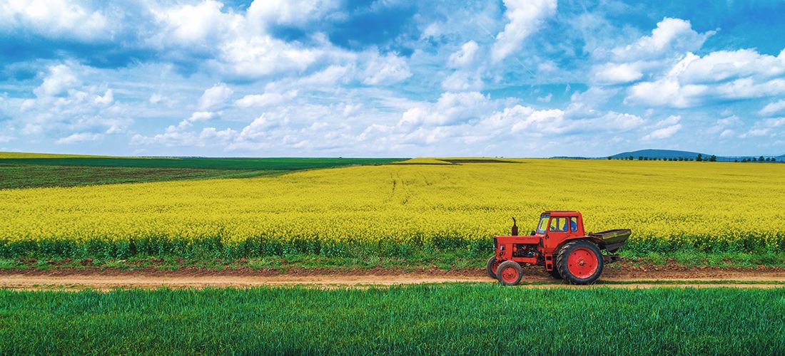 Conservation easement - Tractor driving through a farm field