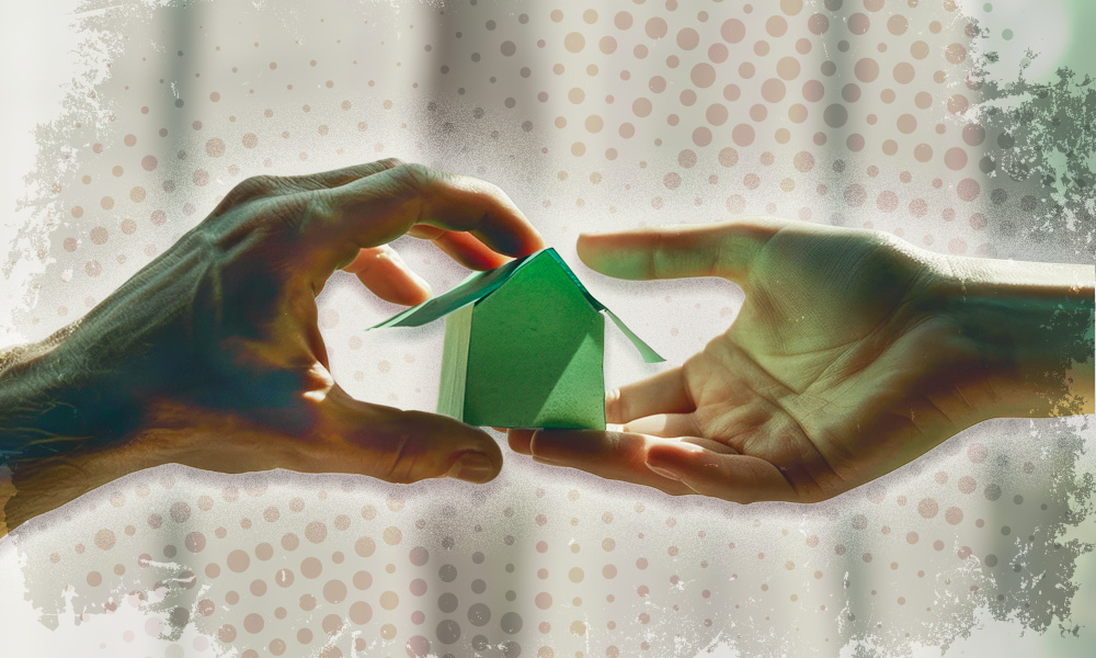 Two hands passing a small green house between them, symbolizing the pros and cons of joint ownership in estate planning