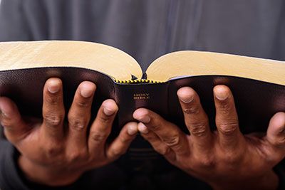 Holding a bible