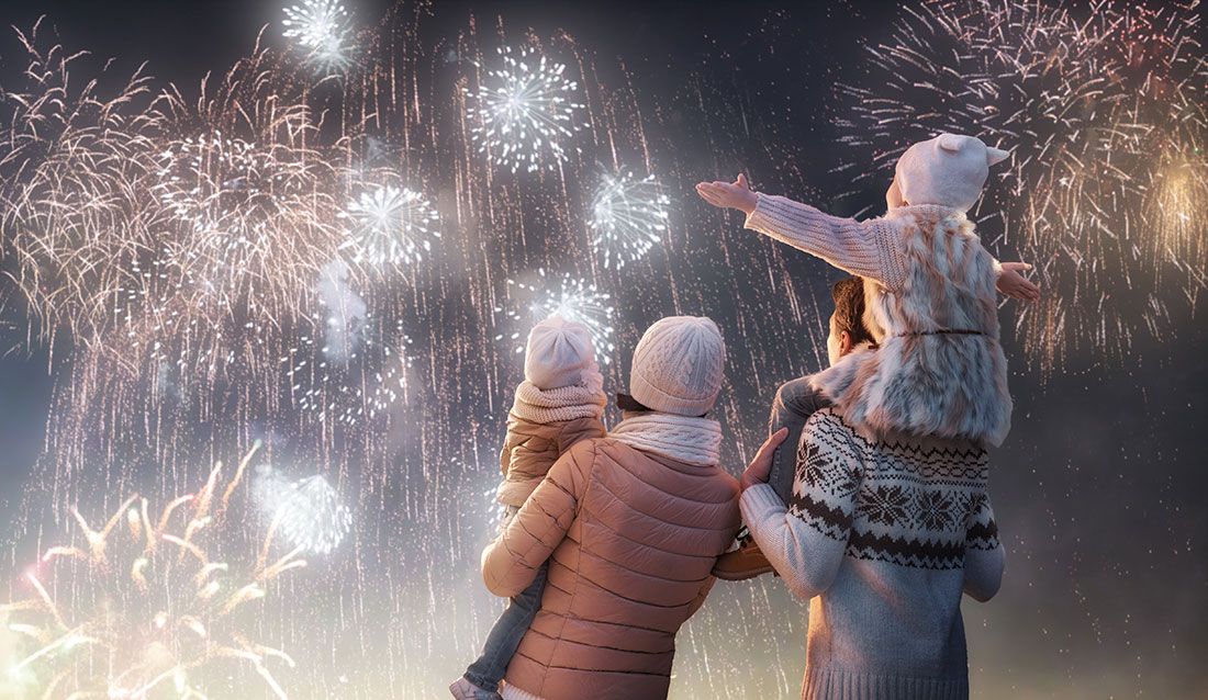 Family on New Years watching fireworks