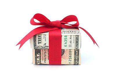 Small gift wrapped with cash