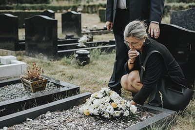 Senior woman at a funeral