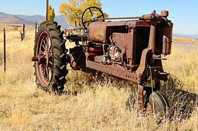 An old tractor in a field