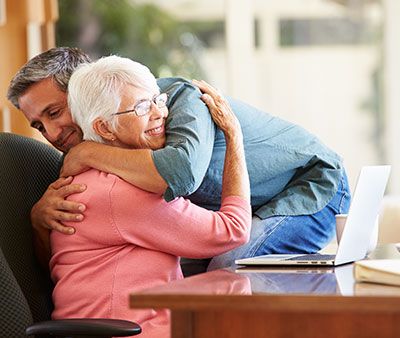 Mother and son hugging