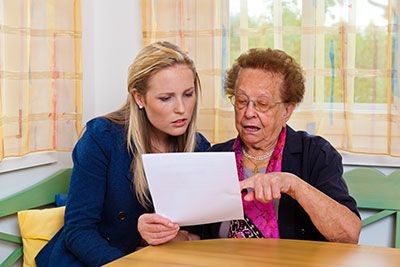 Mother talking to adult daughter about her will