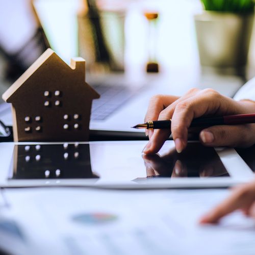 a hand signing a probate document