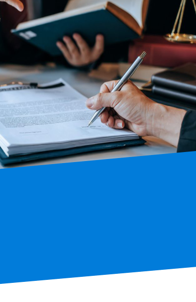 close up of power of attorney documents and a hand holding a pen