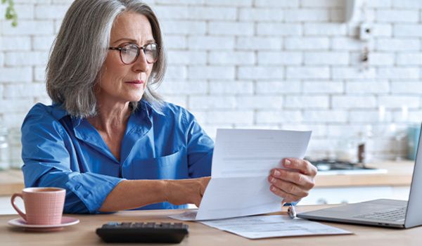 Senior woman reviewing estate plan documents