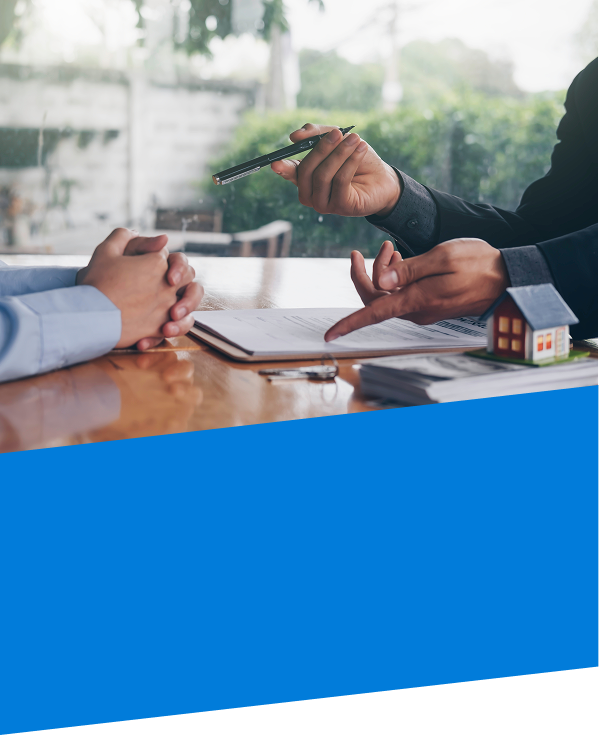 two people sitting at table going over funding a living trust