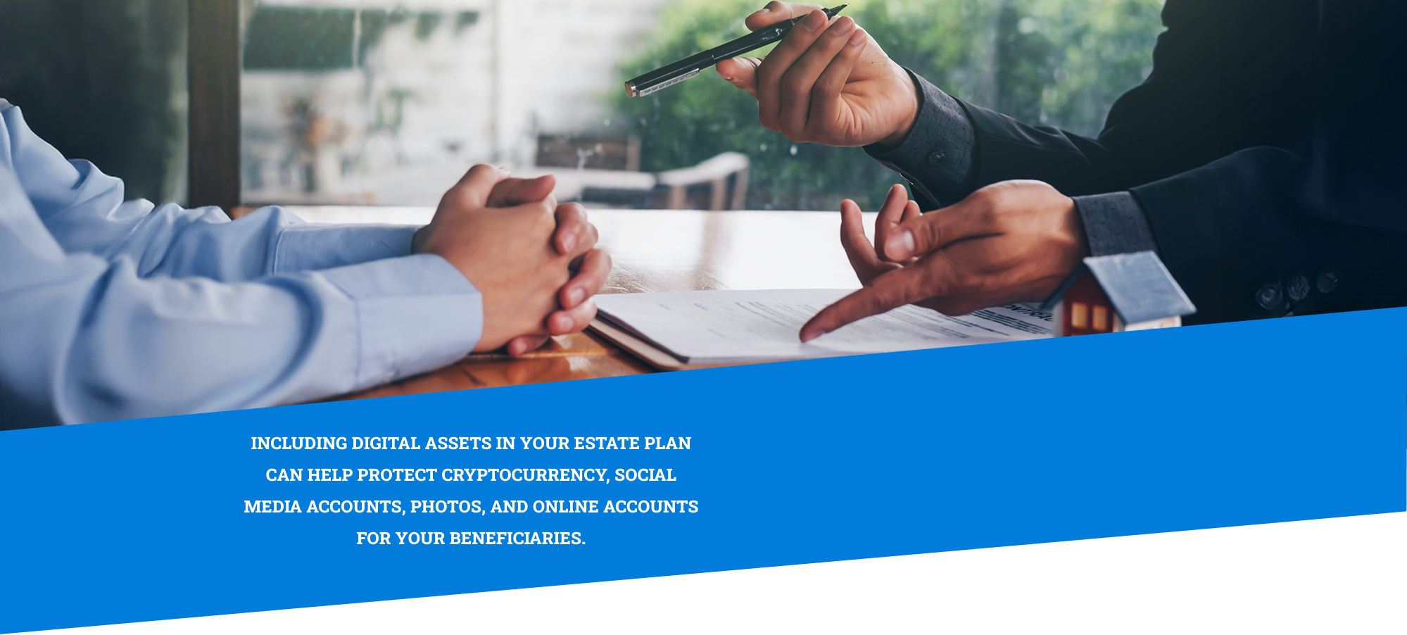 two people sitting at table going over funding a living trust